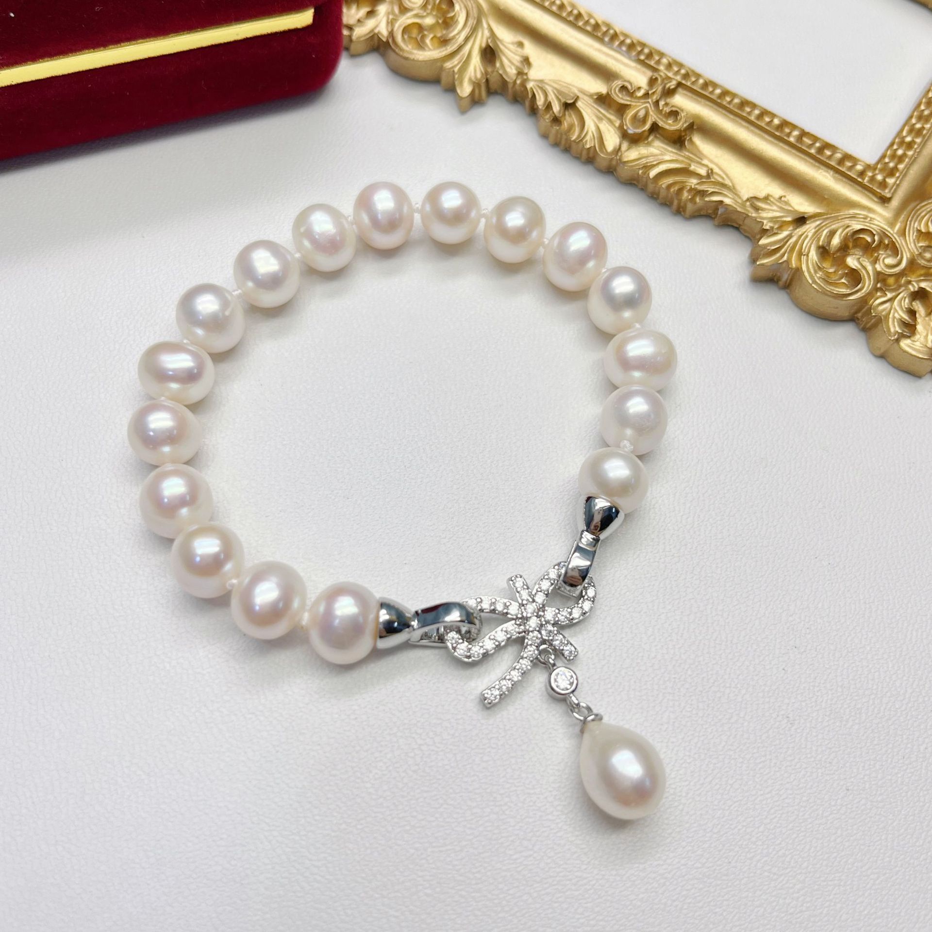 Art- und Weisepassender Frischwasserperlen-Armband-Dame Diamond Bow Pearl Bracelet Pearl Jewelry Wholesale